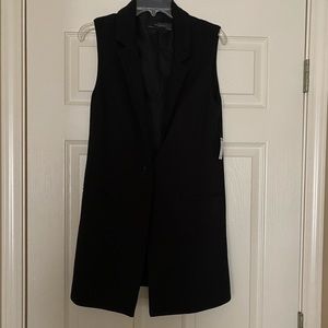 New black long blazer. Sleeveless.